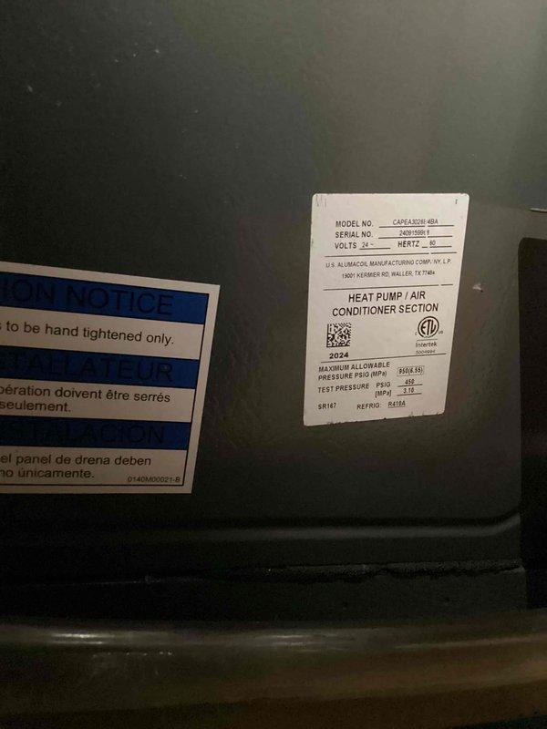 Completed basic monthly cooling maintenance visit on CAPFA0601-05A heat pump/air conditioner unit manufactured by U.S. Aluminum Manufacturing Company. Inspected evaporator coil fins and confirmed proper condensation formation indicating normal system operation. Verified unit specifications including R410A refrigerant type, 24V control voltage, and 60Hz electrical requirements. All components operating within normal parameters with no service issues identified during this recurring maintenance inspection.