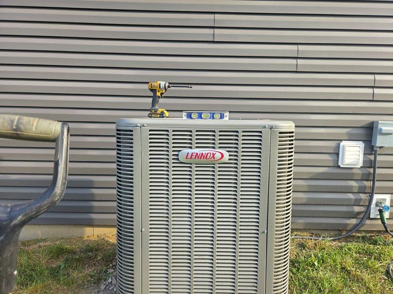 Responded to service call regarding unlevel outdoor condenser unit. Upon arrival, verified unit was significantly out of level using torpedo level across top panel and housing. Adjusted unit positioning and leveling to restore proper alignment, ensuring optimal compressor operation and refrigerant flow. Unit now sits level and stable on pad.