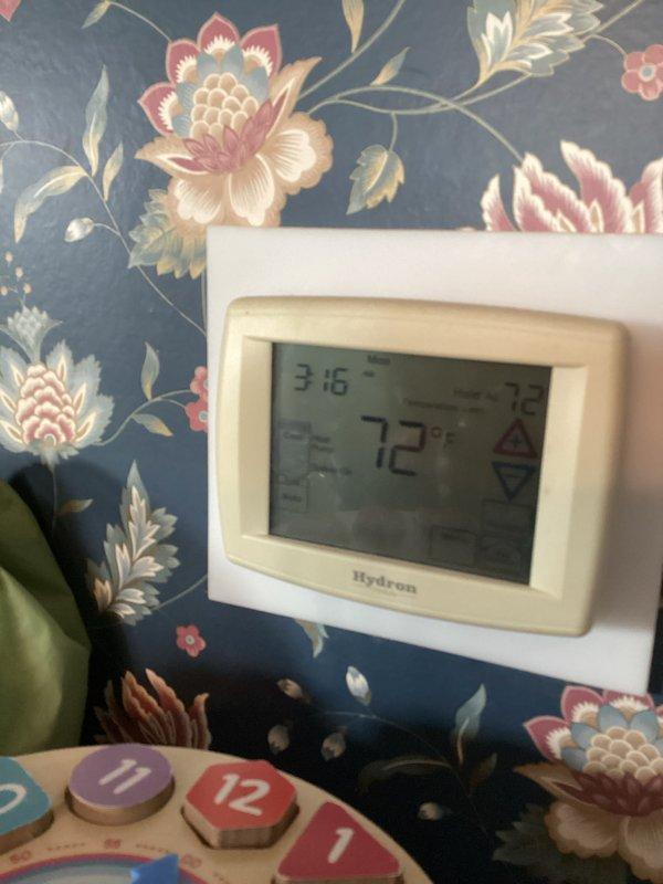 Completed routine maintenance and tune-up on 10-year-old geothermal heating and cooling system. Performed comprehensive inspection of both heating and air conditioning components, verified thermostat operation and temperature accuracy at 72°F, and measured system amperage at 6.58A to confirm proper electrical load. All components operating within normal parameters with no issues identified.