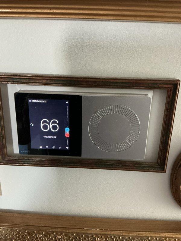 Completed monthly preventive maintenance on two HVAC systems under CCC Basic service agreement. Replaced 20x20x4 air filters on both units to maintain proper airflow and system efficiency. Verified thermostat operation showing 66°F setpoint with system actively circulating air in main room. Inspected air handler and ductwork connections in mechanical room, confirming all components operating within normal parameters.
