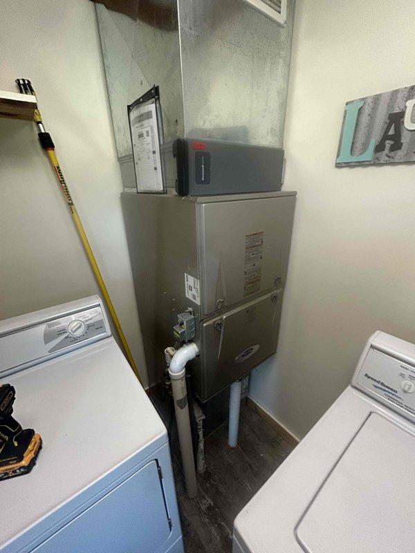 Completed basic monthly heating maintenance visit on residential HVAC system. Inspected indoor furnace unit located in utility room, verifying proper operation of all components, checking gas connections, and examining heat exchanger. Performed visual inspection of outdoor condenser unit, confirmed refrigerant line connections secure, and verified electrical connections intact. All equipment operating within normal parameters with no immediate service needs identified.