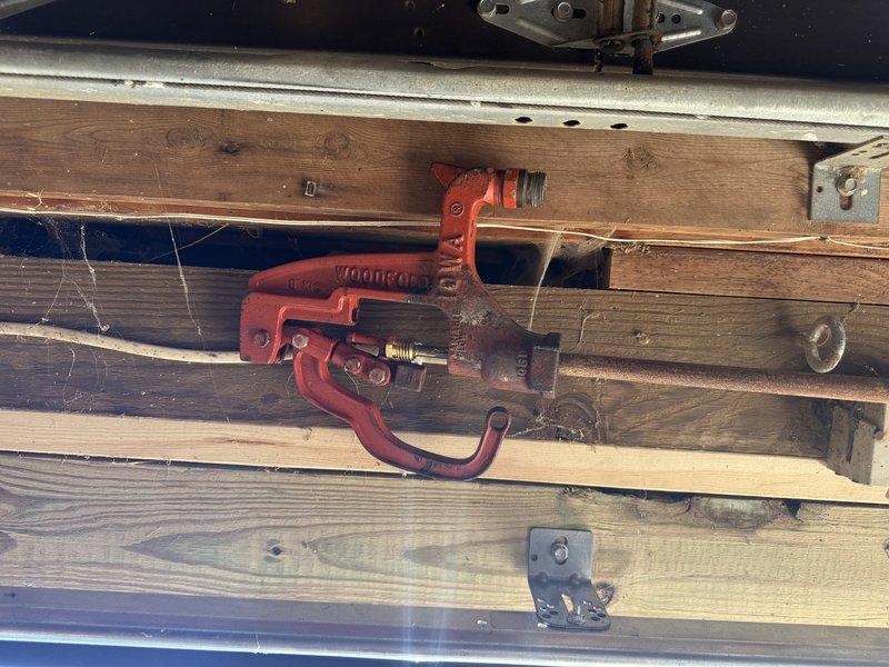Responded to barn yard hydrant leak on Woodford model unit. Upon arrival, found hydrant had been disassembled by property owner with visible dirt and debris contamination deep within the assembly. Assessed hydrant components, cleaned internal mechanisms, removed accumulated sediment, and restored proper operation of the freeze-proof yard hydrant to eliminate leaking condition.