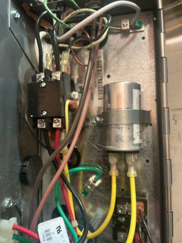 # HVAC Maintenance - Heating System

Completed basic monthly heating maintenance visit on residential HVAC system. Performed standard heating system inspection including visual assessment of furnace components, electrical connections, and control systems. Verified ecobee smart thermostat operation showing proper temperature control at 77°F with humidity reading of 51% and scheduled setpoint of 73°F until 6:00 PM. 

Inspected furnace interior components including blower motor assembly, electrical relay/contactor connections, and associated wiring. All electrical connections including red, white, green, yellow, pink, and brown wires were secure and properly terminated. Blower motor and capacitor assembly showed normal operation with manufacturer labels intact and barcode identification visible.

**Important Note for Future Service:** Filter maintenance required - technician must clean filter on next visit as specified in service protocol. Electronic air cleaner (EAC) filter not included 