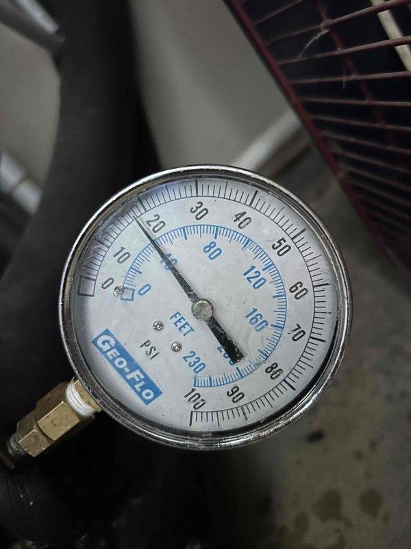 Responded to callback for recurring geothermal system shutdowns and inadequate cooling performance. Performed diagnostic testing on geothermal unit that was experiencing intermittent shutoffs similar to previous service visit. Utilized electrical testing meter to measure system parameters and monitored loop pressure readings with GEOPRO gauge showing approximately 0 PSI, indicating potential ground loop pressure loss or circulation issue. Inspected system components, wiring connections, and copper piping throughout unit. Issue appears related to ground loop system performance affecting unit's ability to maintain adequate heat rejection, causing thermal overload protection to trip unit offline repeatedly.