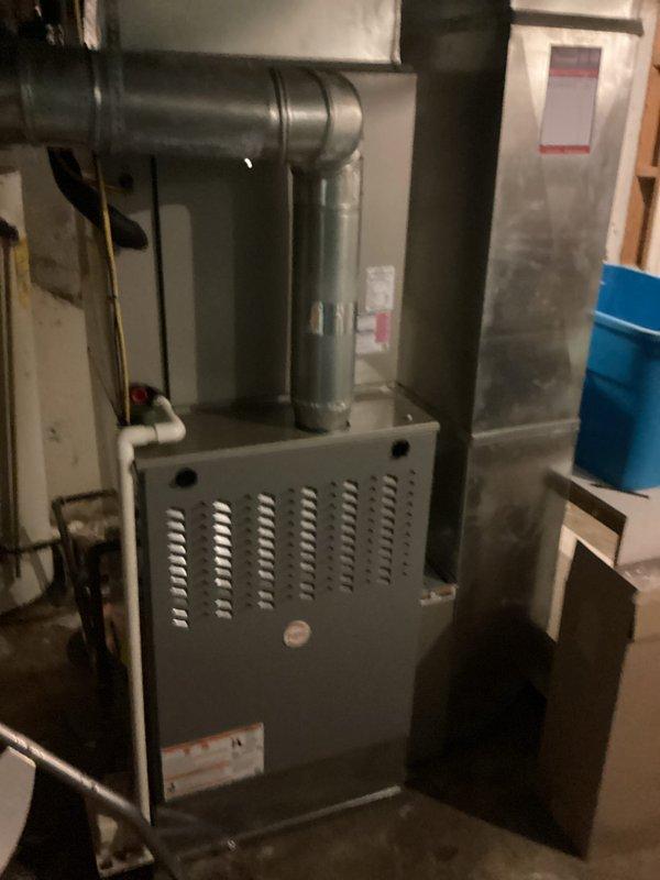 Responded to no-cooling complaint with indoor temperature at 80 degrees. Performed system diagnostics on residential split-system air conditioning unit, inspecting both indoor furnace/air handler and outdoor condensing unit. Documented equipment condition and configuration for service records.