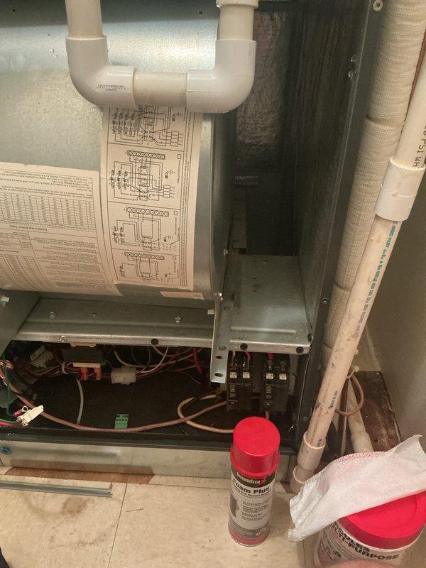 Completed comprehensive duct cleaning service on HVAC system, including thorough cleaning of blower assembly and evaporator coil. Accessed interior components through main cabinet panel, removed accumulated dust and debris from heat exchanger tubes and surrounding metal surfaces, and cleaned condensate drainage system including PVC piping. All electrical connections, circuit breakers, and safety switches were inspected during service, and unit was returned to proper operating condition with improved airflow efficiency.