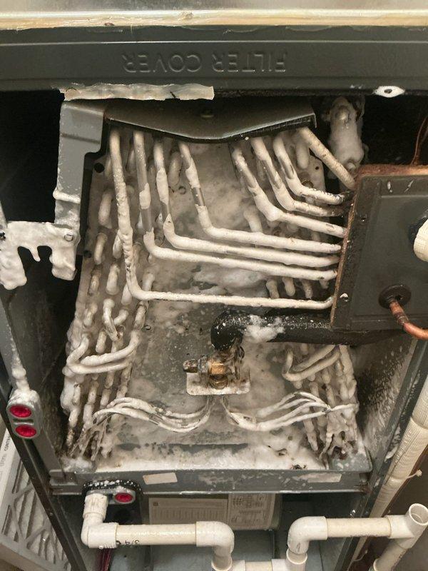 Completed comprehensive duct cleaning service on HVAC system, including thorough cleaning of blower assembly and evaporator coil. Accessed interior components through main cabinet panel, removed accumulated dust and debris from heat exchanger tubes and surrounding metal surfaces, and cleaned condensate drainage system including PVC piping. All electrical connections, circuit breakers, and safety switches were inspected during service, and unit was returned to proper operating condition with improved airflow efficiency.