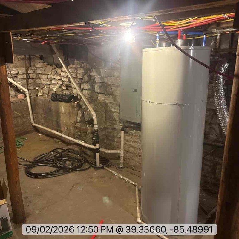 Removed and disposed of existing tanked water heater from basement location. Furnished and installed new 50-gallon heat pump water heater in same location, completing all necessary plumbing connections, electrical hookups, and condensate drainage requirements. Verified proper operation of unit and provided warranty documentation to customer upon completion.