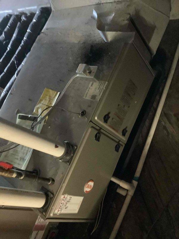 Completed annual cooling maintenance on residential HVAC system consisting of indoor air handler unit and outdoor condensing unit. Performed comprehensive inspection of both components, verifying operational status of condenser fan motor and compressor. Inspected outdoor unit for proper airflow, noting accumulated debris and weathering on housing requiring attention. Evaluated indoor air handler installation in mechanical room, checking PVC vent piping connections, ductwork integrity, and overall system operation to ensure proper cooling function for the season.