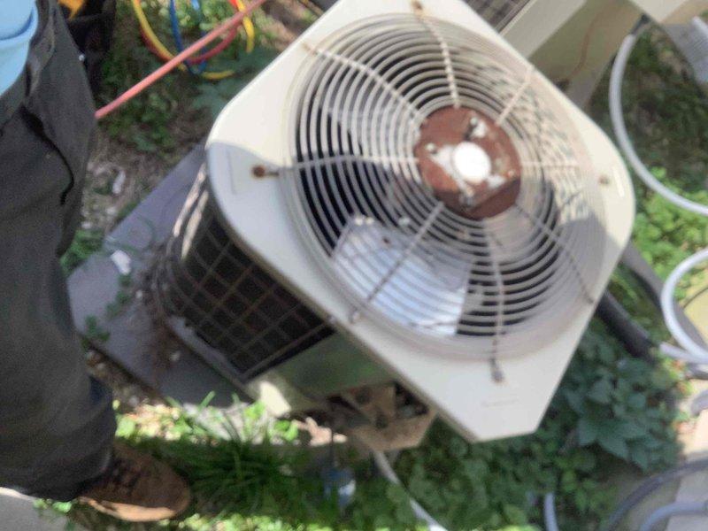 Completed annual cooling maintenance on residential HVAC system consisting of indoor air handler unit and outdoor condensing unit. Performed comprehensive inspection of both components, verifying operational status of condenser fan motor and compressor. Inspected outdoor unit for proper airflow, noting accumulated debris and weathering on housing requiring attention. Evaluated indoor air handler installation in mechanical room, checking PVC vent piping connections, ductwork integrity, and overall system operation to ensure proper cooling function for the season.