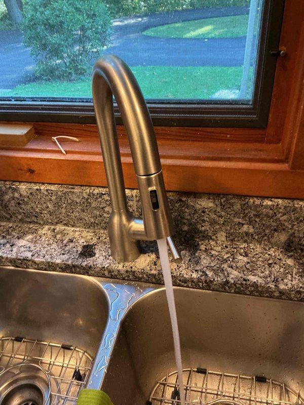 Completed monthly recurring plumbing inspection of residential property. Examined kitchen faucet operation and water flow, verified proper function of pull-down spray head mechanism, and inspected under-sink P-trap assembly and drain connections in bathroom for leaks or deterioration. All fixtures found to be in satisfactory working condition with no immediate repairs required.