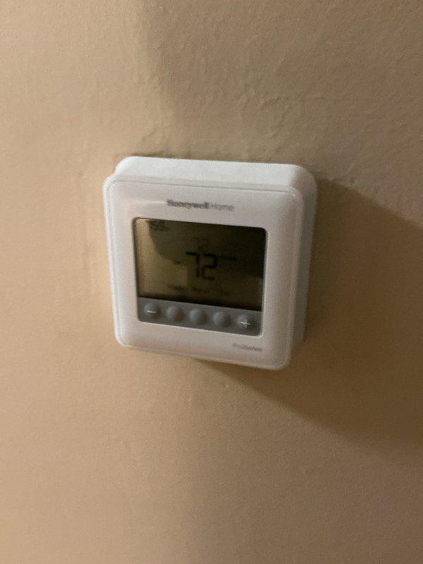 Completed basic monthly heating maintenance visit on residential HVAC system. Inspected Honeywell Home thermostat displaying 72°F and verified proper operation. Documented filter size markings on ductwork (20x25x1) for future reference, though current filter size was unknown prior to visit.