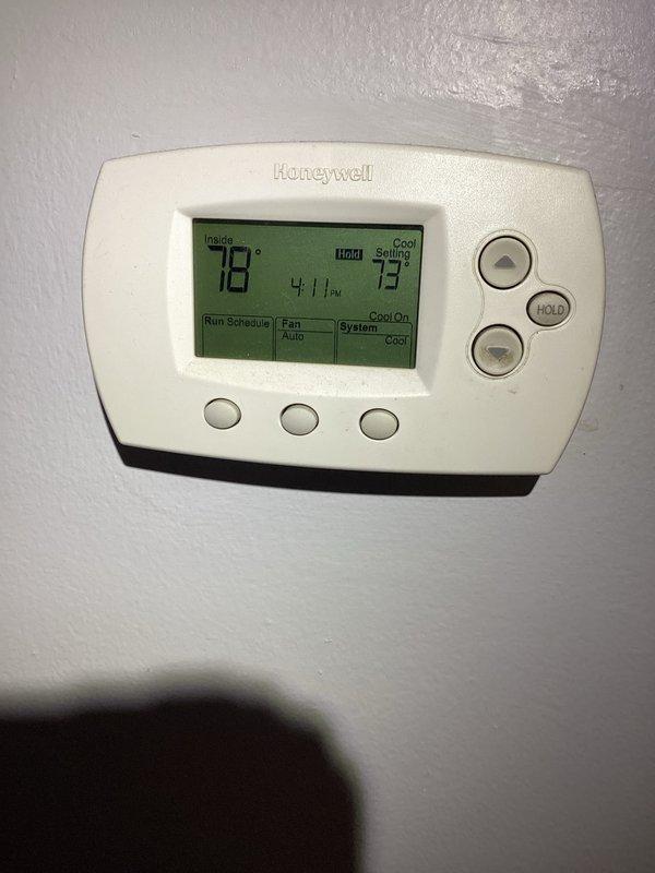 Responded to customer inquiry regarding HVAC system operation and thermostat functionality. Upon inspection, documented thermostat displaying 78°F with cooling system active and noted severely corroded electrical connections within junction box that pose potential safety and reliability concerns. Advised customer of findings and recommended scheduling repair service to address corroded wiring connections to prevent system failure.