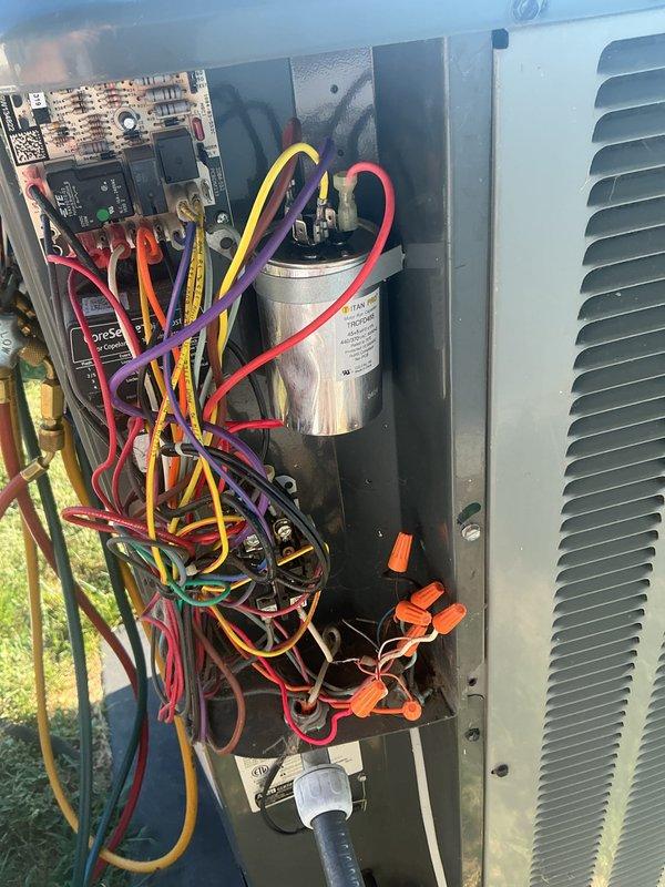 # HVAC Maintenance - Cooling System Service

Completed basic monthly preventive maintenance on residential cooling system. Performed refrigerant pressure diagnostics using manifold gauge set at the outdoor condenser unit, verifying system charge levels and operational parameters across both high and low-side pressures. Inspected electrical components within the condensing unit, including capacitor connections, control board terminals, and associated wiring harnesses to ensure proper electrical integrity and safe operation. All condenser coil fins were found in clean condition with adequate airflow. System operational checks confirmed unit is functioning within normal parameters.