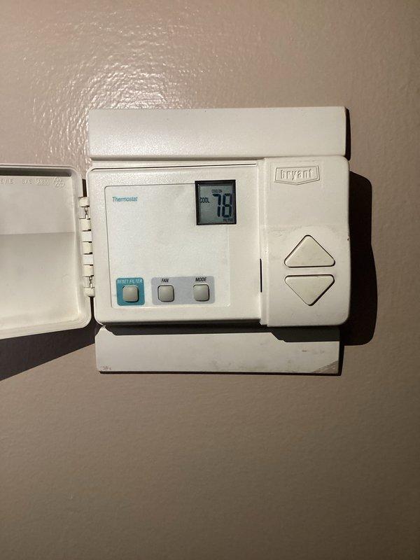 Completed routine monthly HVAC maintenance visit including cooling and heating system inspection. Verified Bryant programmable thermostat operation at 78°F in cooling mode, inspected outdoor condenser unit for proper operation and clearance, and documented equipment conditions. Filter size remains to be determined for future service visits.