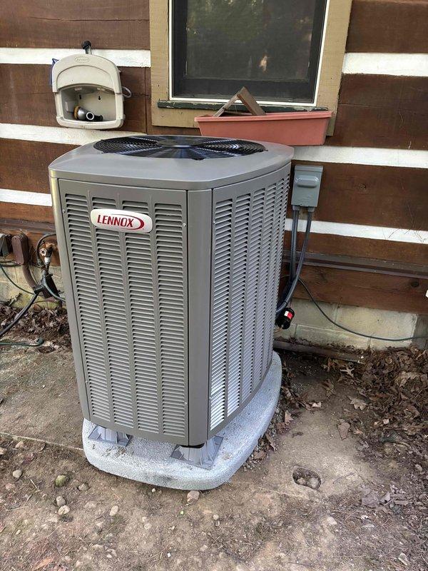 Completed full HVAC system installation consisting of Lennox heat pump and gas furnace. Installed outdoor condensing unit on composite pad against exterior wall with proper clearances, ran necessary electrical and refrigerant line connections, and mounted furnace indoors. Verified system operation with temperature readings showing proper heating performance at 71°F. All equipment installed per manufacturer specifications, service financing documentation completed and identification verified on file.