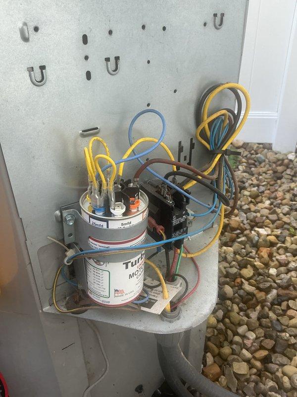 Completed comprehensive AC tune-up on 8-year-old Carrier split system responding to customer report of unusual operational sounds. Performed full system diagnostics including inspection of dual-run capacitor, thermostat calibration verification at 74°F cooling setpoint, and electrical connection assessment. All components found operating within normal parameters; system maintaining proper cooling performance with no adjustments required to existing configuration.