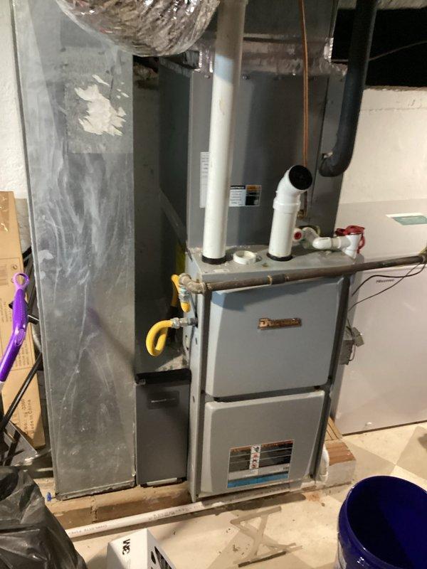 Responded to no cooling complaint on residential split system air conditioning unit. Upon arrival, performed diagnostic evaluation of indoor furnace/air handler unit located in basement and outdoor condensing unit. System had been experiencing intermittent cooling issues that progressed to complete loss of cooling capacity. Conducted comprehensive system assessment including visual inspection of both indoor and outdoor components, verified proper electrical connections, and checked refrigerant levels and pressures. Identified root cause of cooling failure and performed necessary repairs to restore system to proper operating condition. System tested and confirmed operational with adequate airflow and temperature differential upon completion.