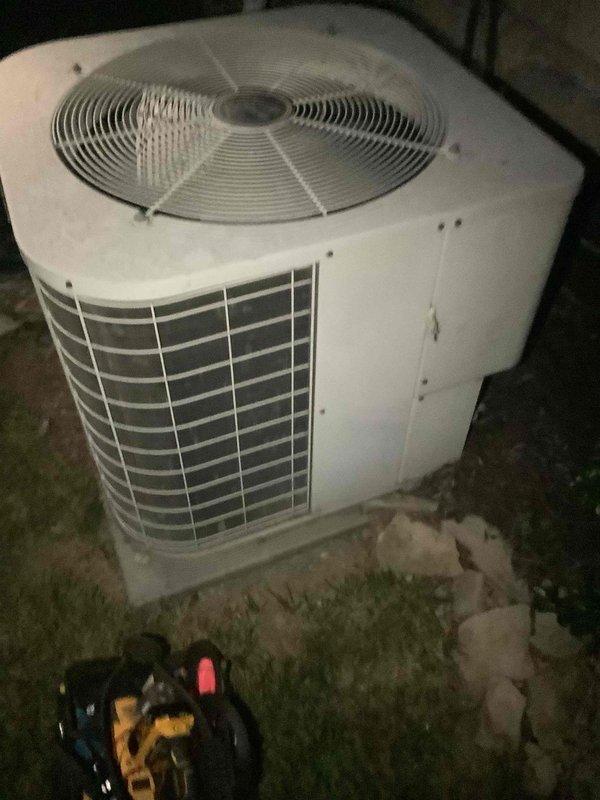 Performed residential air conditioning service call on split system with outdoor condenser unit and Tempstar furnace with indoor evaporator coil. Conducted system inspection and diagnostics during evening hours, evaluating both outdoor condensing unit operation and indoor air handler components. Verified proper airflow through condenser coil fins, checked refrigerant pressures, and assessed electrical connections at outdoor unit. Inspected indoor furnace cabinet housing evaporator coil, reviewed blower motor operation, and examined ductwork connections for proper sealing. System operational upon completion of service visit.