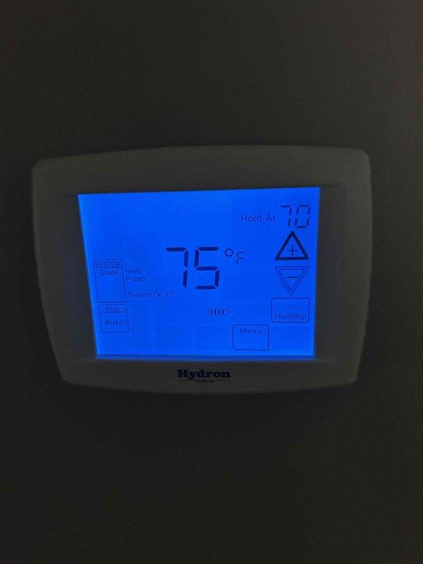 Completed preventive maintenance on geothermal heat pump system under CCC-Geo Basic service agreement. Inspected and tested all cooling components, verified thermostat operation showing system holding at 79°F with current indoor temperature of 75°F, and confirmed proper system function. Customer requires 20x25x4 filters which are not included in service agreement.
