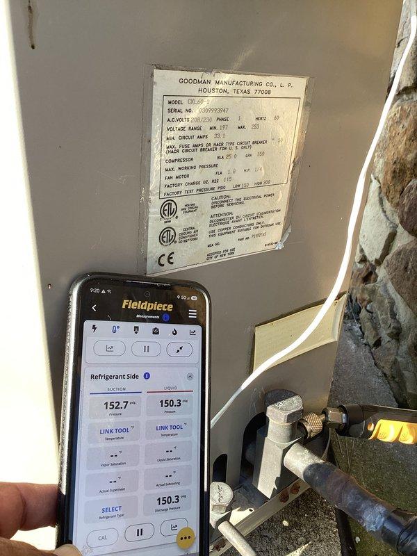 Performed routine maintenance on Goodman AC unit located in dining room, including system diagnostics and performance testing using digital gauges showing superheat and subcool temperatures within normal operating range. Inspected kitchen thermostat for proper operation and discussed commercial membership options with customer.