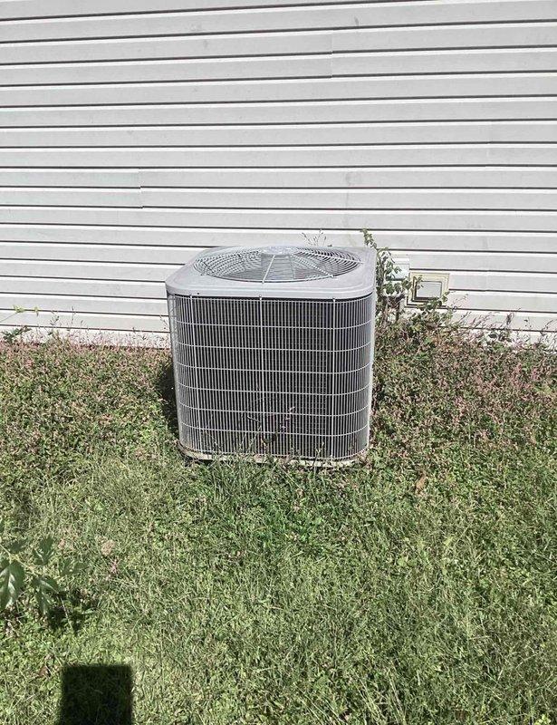 Completed basic monthly cooling maintenance on residential HVAC system. Inspected outdoor condenser unit, verified operational status of fan and compressor, and checked electrical connections at disconnect box. Accessed indoor air handler, inspected existing filter with KOCH branding showing previous service date, and performed standard system checks. Note: 16x20x4 filter not included with this maintenance service per agreement.