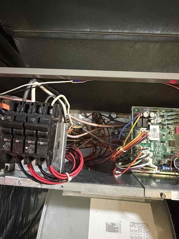 Completed installation of electric heater pack assembly on HVAC system. Installed 20.0/15.0 kW dual-circuit heating element rated for 240/208 volts, single-phase operation with each circuit drawing 41.7/36 amps. Connected all electrical wiring to breaker panel and control board, verified proper voltage supply, and documented equipment specifications including model ECB48 and serial number for warranty registration.