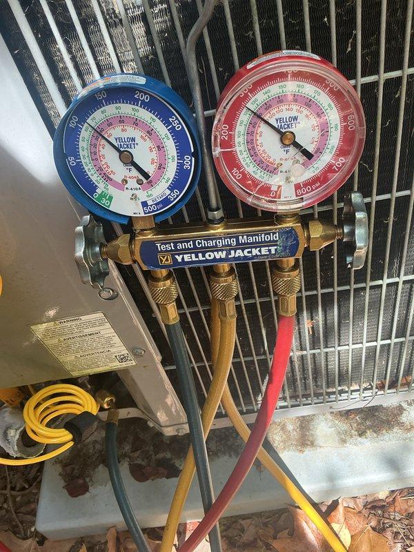 Completed cooling preventative maintenance service on residential HVAC system. Performed system diagnostics, checked refrigerant pressures and temperatures using manifold gauge set, verified thermostat operation showing system cooling to setpoint of 68°F with ambient reading of 73°F. Standard monthly filter replacement due (20x20x4 filter not included in service).