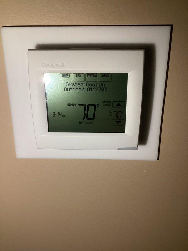 Completed basic monthly heating maintenance visit on residential forced-air furnace system. Performed visual inspection of heating unit, verified thermostat operation showing system in cooling mode at time of visit, and documented equipment condition through photographic records. Standard filter size 20X25X4 was not included in this service visit per agreement.