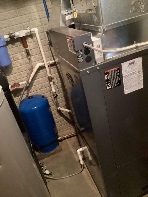 Completed basic monthly heating maintenance visit on residential forced-air furnace system. Performed visual inspection of heating unit, verified thermostat operation showing system in cooling mode at time of visit, and documented equipment condition through photographic records. Standard filter size 20X25X4 was not included in this service visit per agreement.