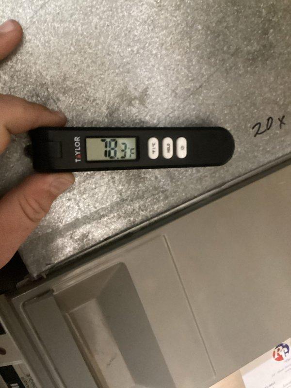 Responded to emergency callback on twelve-year-old geothermal system with unresolved issues from previous repair attempt. Upon inspection, discovered severe icing condition on refrigerant lines with surface temperatures measuring 18.3°F and supply air temperature at 35.5°F, indicating significant system malfunction. Documented frozen coil assembly with heavy frost accumulation on suction line, confirming inadequate refrigerant flow or low charge condition affecting heat pump operation.