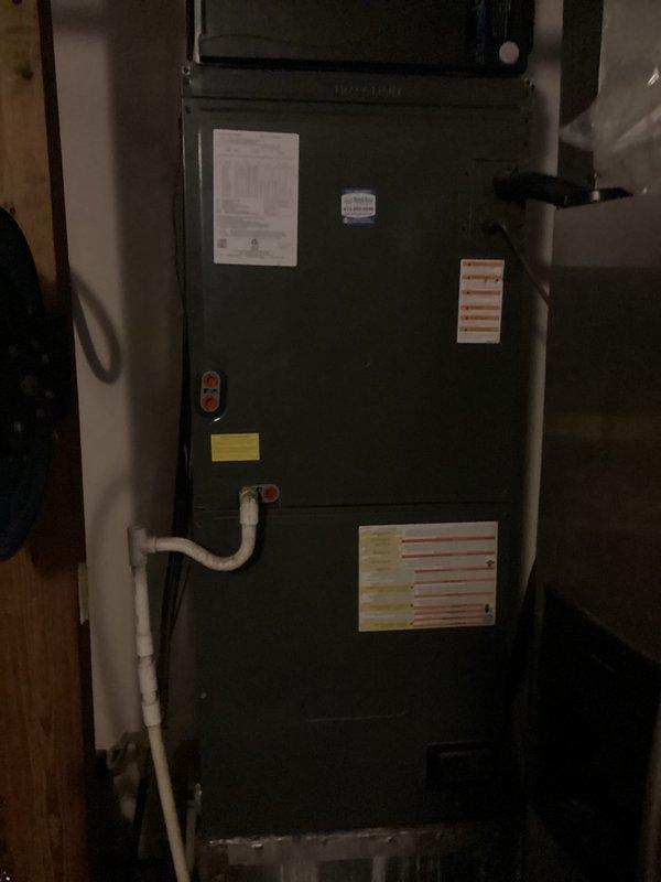 Completed monthly preventative maintenance on residential heating system. Performed comprehensive inspection of furnace unit, verified thermostat operation at 71°F, and confirmed all system controls and safety mechanisms functioning properly. Documented equipment condition with photos showing operational status of both thermostat and heating unit, with all components operating within normal parameters.