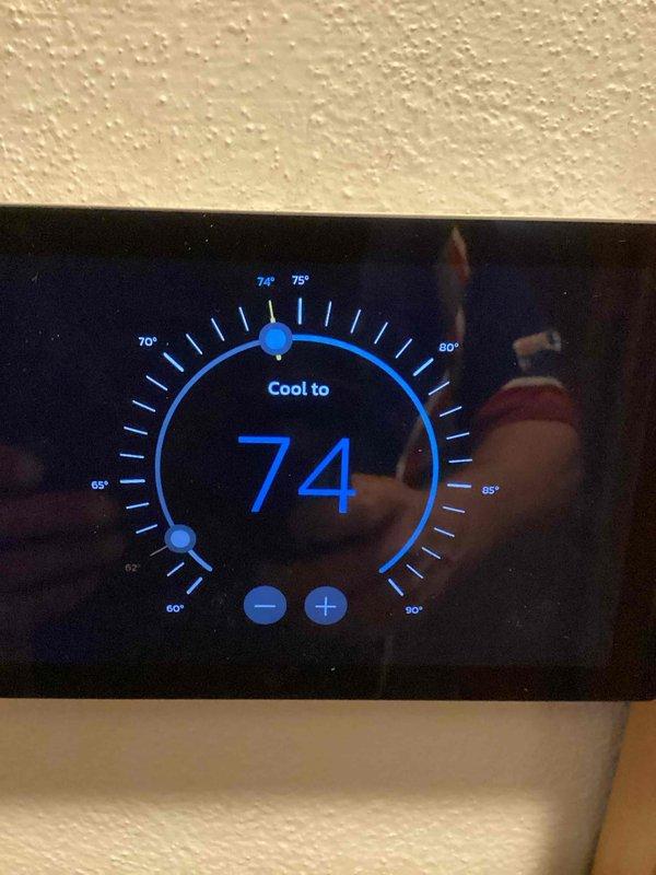 Completed annual cooling maintenance visit on system. Verified thermostat operation showing unit set to cool mode at 74°F setpoint with proper display functionality. Customer's comfort club membership had expired; noted 16x20x4 filter replacement owed as part of service agreement.