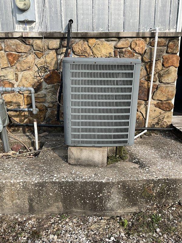 Performed diagnostic evaluation on residential multi-zone cooling system and identified failed compressor in one of three outdoor condensing units. Determined existing Goodman system had reached end of serviceable life due to age and component failure. Provided estimate for complete HVAC system replacement including new Lennox equipment to restore full cooling capacity and improve system efficiency.