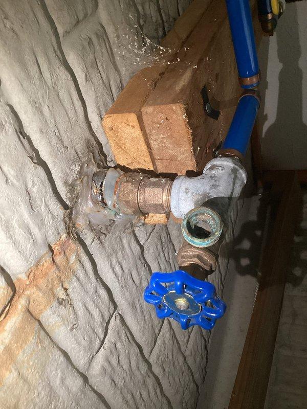 Responded to water company notification regarding standing water in driveway and meter shutoff. Conducted thorough inspection of main water line from meter to structure, identifying leak location in underground service line. Excavated affected area, exposed damaged section of corroded piping, and performed main line repair by replacing compromised section with new materials. Verified system integrity, restored water service, and confirmed no active leaks at meter or throughout the repaired section.