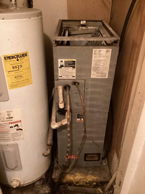 Responded to cooling complaint at residential property. Upon arrival, found thermostat displaying 76°F with system running in cooling mode. Inspected air handler unit in basement and verified equipment operation, checked airflow, and examined system components for proper functionality. Documented equipment condition with photos showing thermostat settings and air handler installation. System evaluated and customer advised of findings.