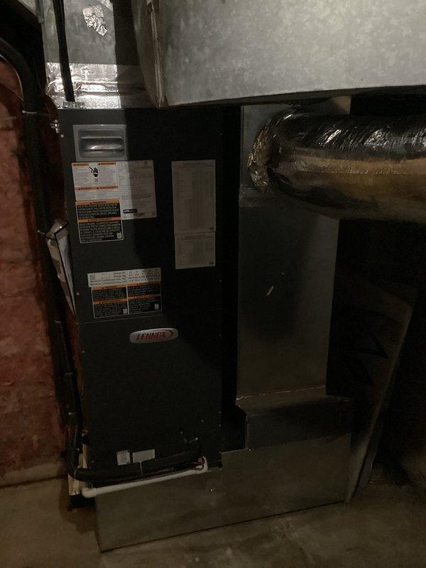 Responded to service call for newly installed system not maintaining set temperature. Upon arrival, reviewed control panel notifications showing multiple active alerts including compressor top cap switch open and low pressure switch faults on heat pump outdoor unit. Inspected air handler installation in basement and verified proper ductwork connections and refrigerant line routing. System operational but experiencing intermittent pressure-related faults preventing adequate cooling capacity. Documented equipment conditions and alert history for further diagnostic evaluation and resolution of pressure switch issues affecting temperature control performance.