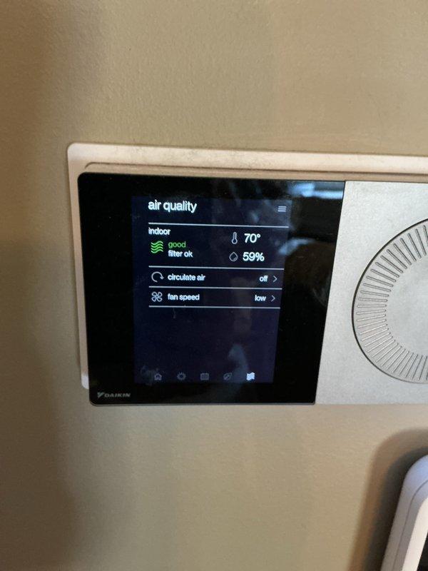 Completed basic monthly cooling maintenance on two HVAC systems. Performed standard inspection procedures including filter replacement with 20x20x1 filters, system diagnostics using digital measuring equipment, and verification of operational parameters. Checked air quality readings on Daikin control interface showing indoor temperature at 70°F with 59% humidity and confirmed good filter status. Fan speed settings verified at low with circulation mode off. Both systems operating within normal parameters with all components functioning properly.