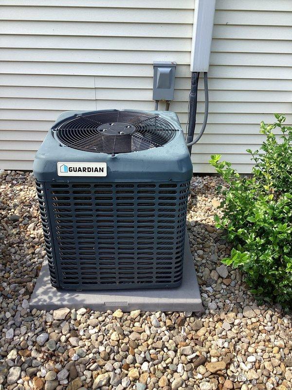Responded to service call for water discharge from indoor air handler running down wall into basement. Upon inspection, located source of water leak at evaporator coil drain system. Cleared clogged condensate drain line that was causing water to overflow from drain pan. Verified proper drainage flow and confirmed no water intrusion at wall penetration. Tested system operation and confirmed unit cooling properly with no further water discharge. Left system in normal operating condition.