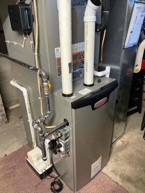 Performed comprehensive cooling maintenance on Lennox HVAC system under CCC agreement. Completed electrical diagnostics using digital clamp meter, verifying proper amperage and voltage readings on control board and system components. Replaced 20x25x4 air filter as included with maintenance agreement. Inspected furnace cabinet, condensate pump assembly, PVC vent and intake piping, gas line connections, and all electrical controls. System tested and operating within manufacturer specifications.
