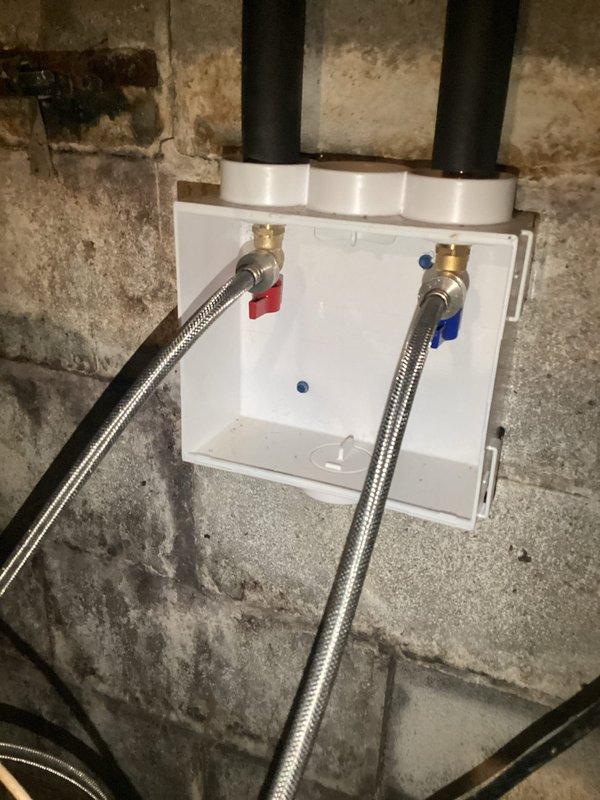 Completed monthly membership plumbing inspection of residential property. Examined kitchen sink faucet assembly with pull-out spray head and inspected basement water supply connections including shut-off valves with braided flex lines. All fixtures photographed and found to be in operational condition with no immediate repairs required.