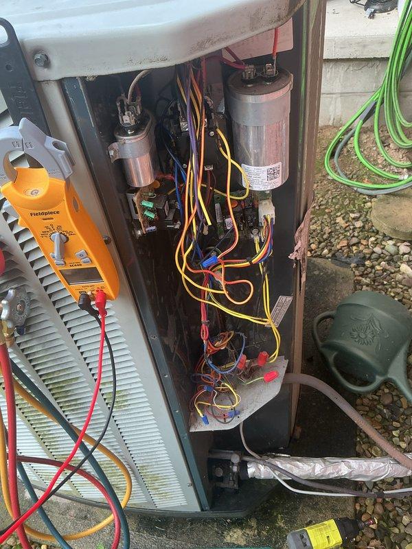 Performed comprehensive cooling and heating maintenance on residential HVAC system. Accessed outdoor condensing unit and indoor air handler for complete inspection. Utilized diagnostic testing equipment to verify capacitor functionality and electrical connections. Documented filter size as 20x22x1 and confirmed proper installation of air filtration system. Inspected evaporator coils, blower assembly, and all electrical components including wiring connections and control circuits. All system components found operational with proper connections maintained throughout both heating and cooling equipment.