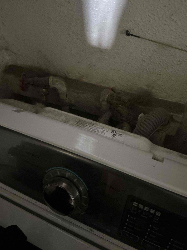 Completed monthly prepaid plumbing inspection of residential water heater and laundry area. Examined water heater venting system, confirmed proper installation of metallic vent pipe, and inspected PEX supply lines and connections for leaks or deterioration. Verified washing machine water supply hookups and drainage connections are secure and functioning properly, with no visible signs of active leaks or immediate concerns noted during inspection.