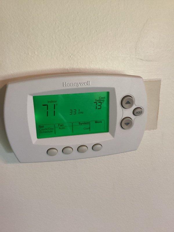 Completed basic monthly HVAC maintenance on heating system. Inspected Honeywell digital thermostat, confirmed proper operation with display showing indoor temperature of 71°F and cooling setpoint at 73°F. Removed and replaced dirty air filter with visible dust accumulation; customer to provide 16x25x4 filter as it is not included in maintenance agreement. All equipment operating within normal parameters.