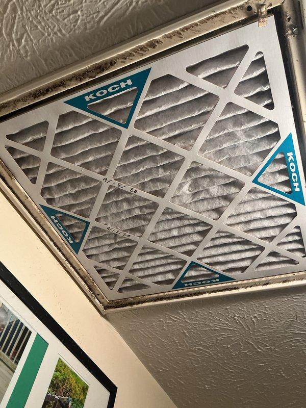 Completed annual maintenance on a 1-year-old air conditioning system located in garage. During inspection, discovered extensive rust and corrosion on evaporator coil copper tubing and framework, indicating premature deterioration that will require monitoring and likely replacement in near future. Replaced heavily soiled air filter that showed significant dust and debris accumulation. Performed standard tune-up procedures including system performance verification, refrigerant level check, electrical connection inspection, and condensate drain evaluation. System currently operating within normal parameters despite coil corrosion concerns. Documented equipment condition with photographs and advised customer of evaporator coil deterioration for future service planning.