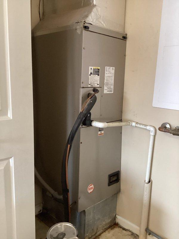 Completed annual basic heating maintenance visit on residential HVAC system. Performed standard inspection of stacked air handler and furnace unit, verified proper operation of all components, and documented filter size with photographs for future reference. Inspected outdoor electrical components including capacitor and contactor, confirmed all wire connections secure and system operating within normal parameters.