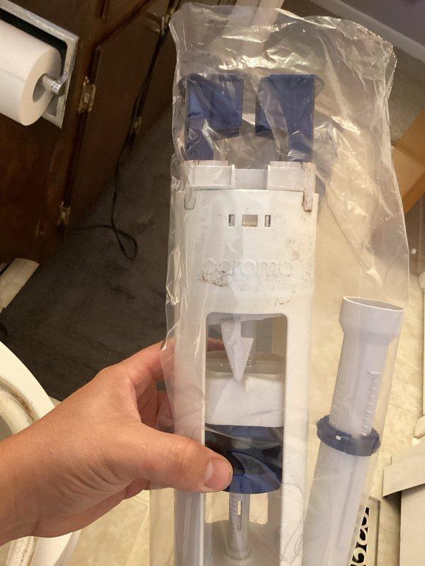 Replaced defective toilet flush valve assembly with new unit. Removed old fill valve mechanism and installed replacement component featuring adjustable height settings and improved water flow control. Tested system operation to ensure proper tank filling, water shutoff at correct level, and elimination of running water issues.