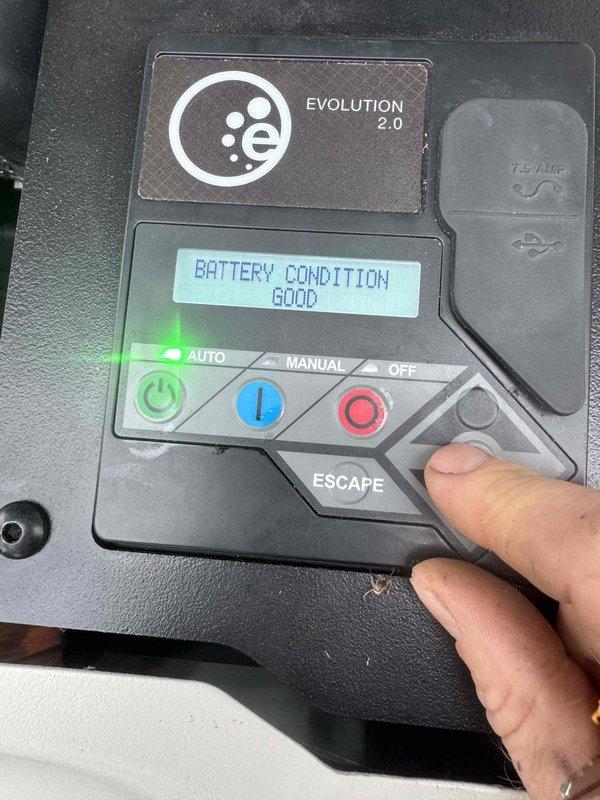 Performed scheduled maintenance on residential standby generator equipped with Evolution 2.0 controller. Verified battery condition reported as good on diagnostic display, confirmed unit operational status with 2.3 run hours logged on system. Tested AUTO mode functionality and verified all control panel operations including manual and off modes responding properly.