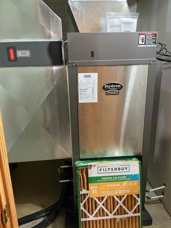 Completed monthly preventive maintenance on Hydron powered unit heating system manufactured by Raypak Corporation. Performed comprehensive system inspection including visual assessment of all accessible components, verified operational status of control systems as indicated by status lights, and documented system specifications. Customer-supplied MERV 11 Filterbuy air filter (20x25x5) was not installed per service agreement terms.