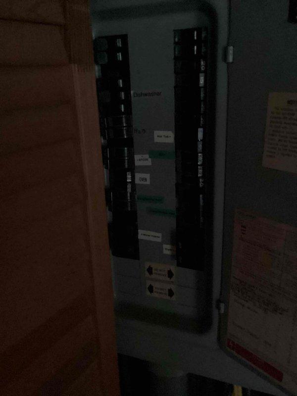 Conducted on-site assessment for tankless water heater and water softener installation. Evaluated existing electrical panel capacity and configuration to determine compatibility with proposed equipment, documenting current breaker layout and available amperage for future installation requirements.